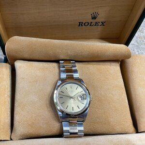 Rolex Date Two Tone Champagne Dial Watch 15203 Includes box/papers.
